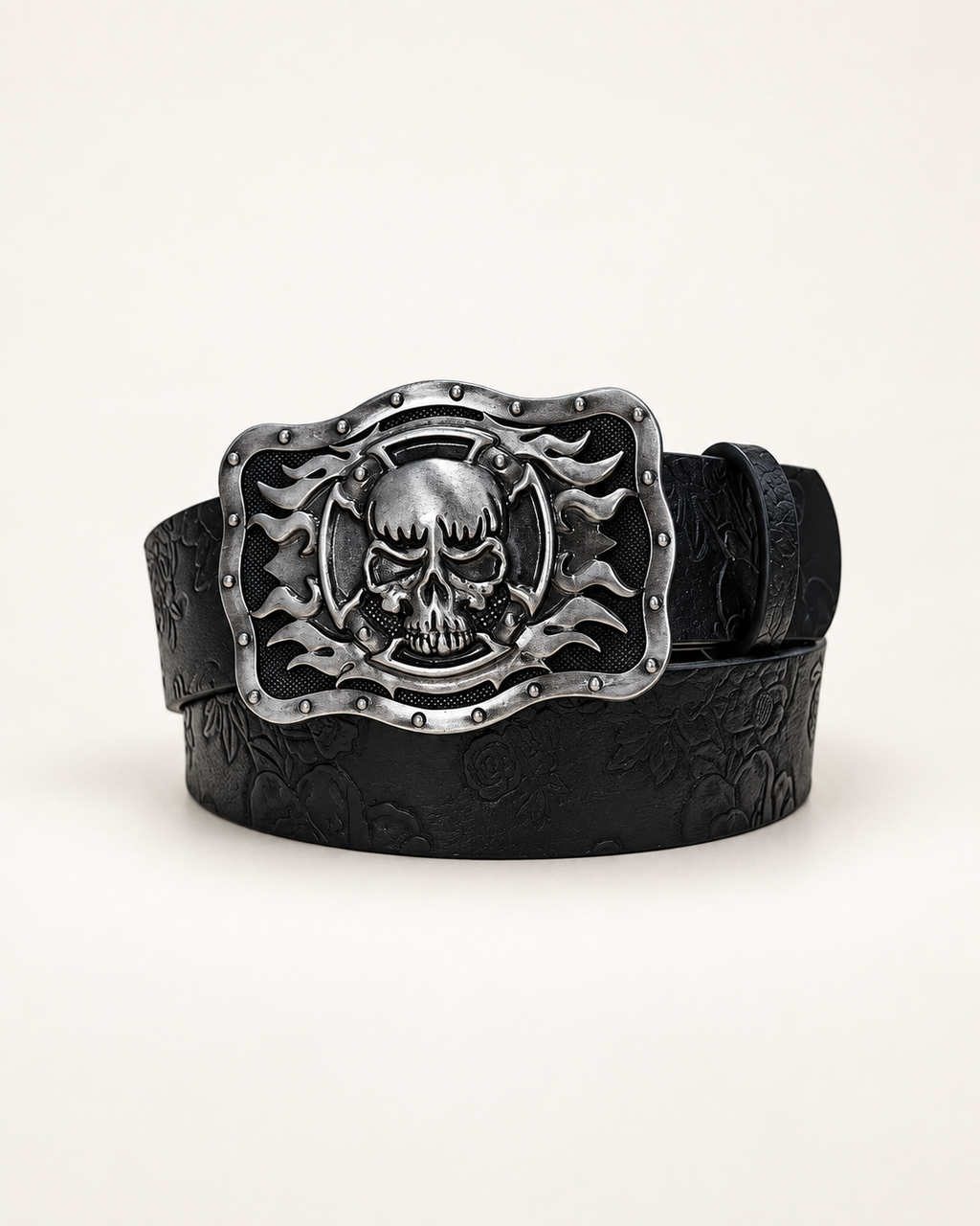 Black embossed belt with a silver-tone skull and flame buckle
