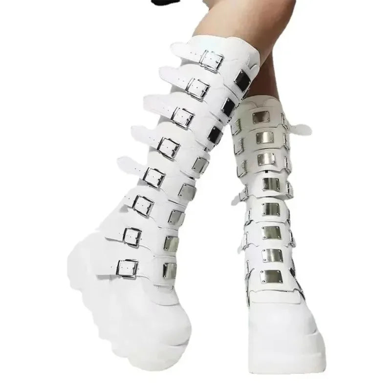 White platform mid-calf boots with buckle straps